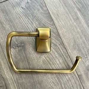 Amerock Clarendon Toilet Paper Holder in Gilded Bronze